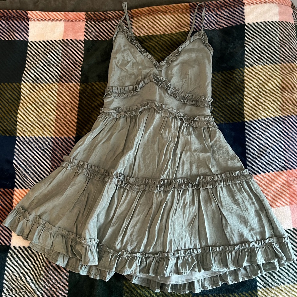 green ruffled dress